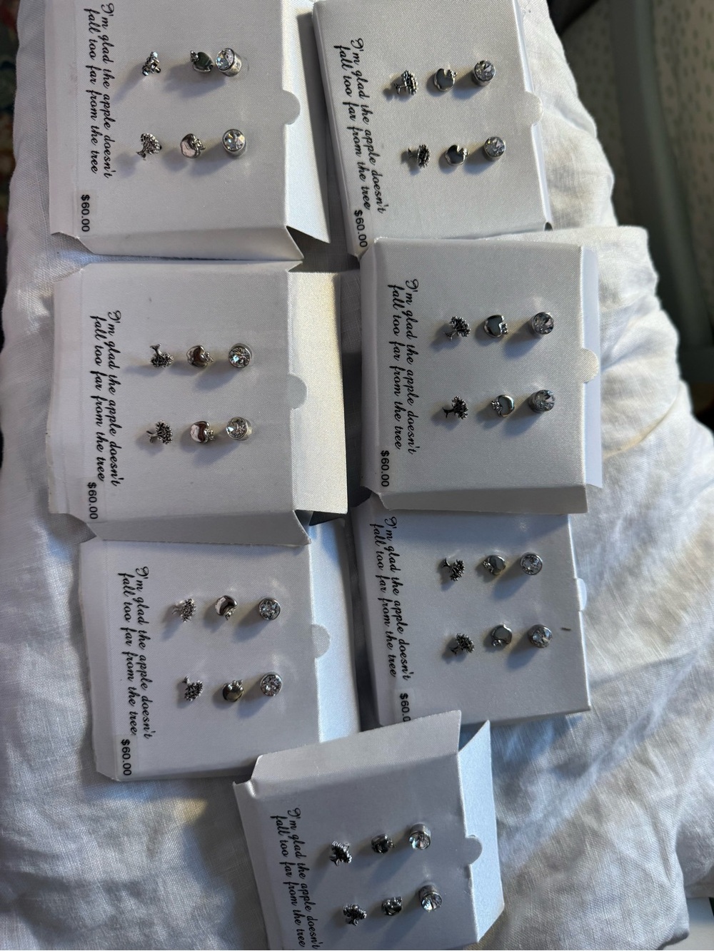 7 silver plated earring sets. NWT. Apple, tree.